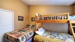 Guest Bedroom with Queen Bed and a Twin over Full Bunk Bed